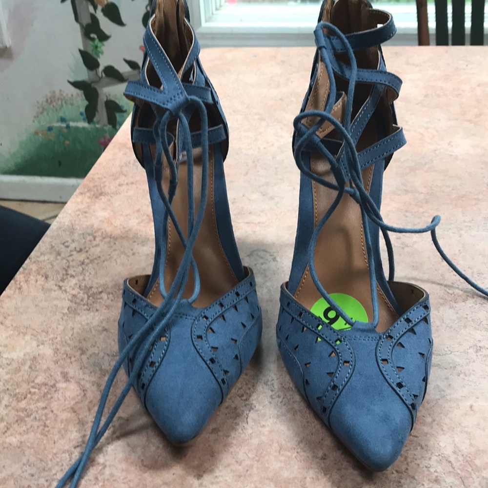 Blue denim suede tie heals never worn